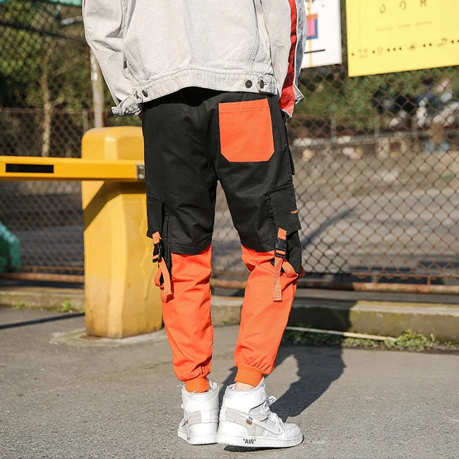 HERREN CARGO HOSE IN ORANGE UND SCHWARZ