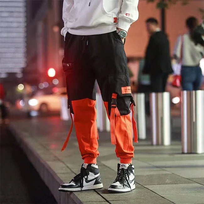 HERREN CARGO HOSE IN ORANGE UND SCHWARZ Orange / S