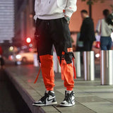 HERREN CARGO HOSE IN ORANGE UND SCHWARZ Orange / S