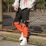 HERREN CARGO HOSE IN ORANGE UND SCHWARZ
