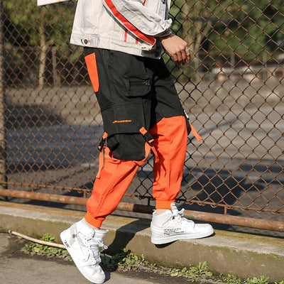 HERREN CARGO HOSE IN ORANGE UND SCHWARZ