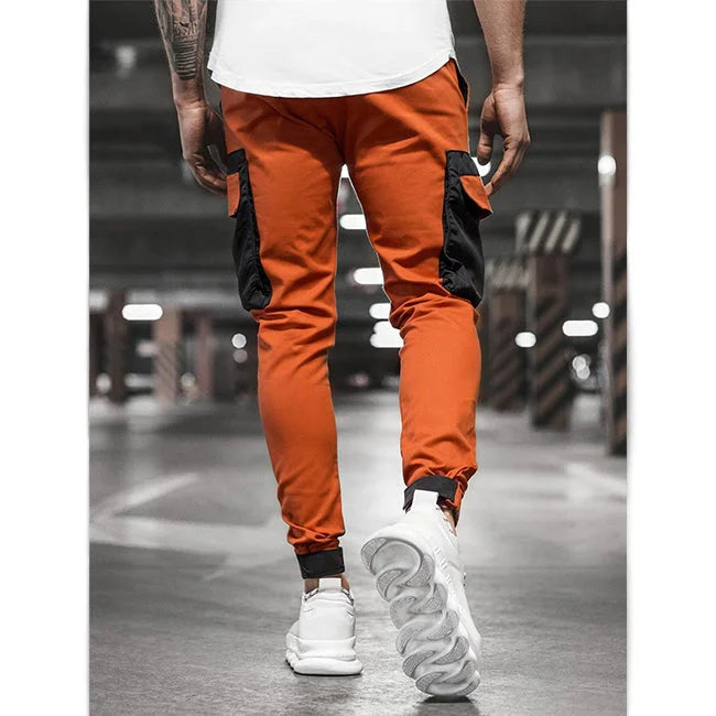 ORANGE CARGO HOSE MIT RIPPMUSTER