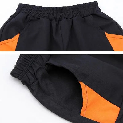 SCHWARZ ORANGE CARGO HOSE JUNGEN