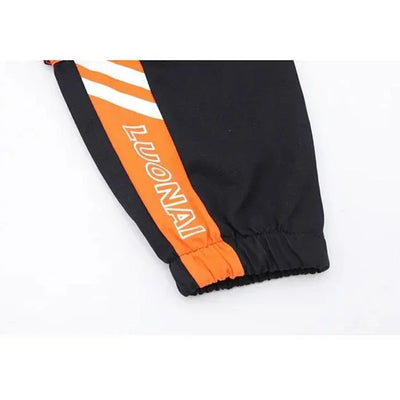 SCHWARZ ORANGE CARGO HOSE JUNGEN