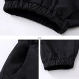 SCHWARZE CARGO HOSE FÜR JUNGEN MIT GÜRTEL