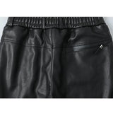SCHWARZE CARGO HOSE LEDERIMITAT