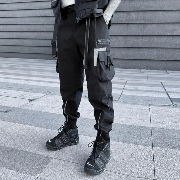 SCHWARZE CARGO HOSE MIT SEITLICHEN REFLEXIONSTASCHEN Schwarz / M