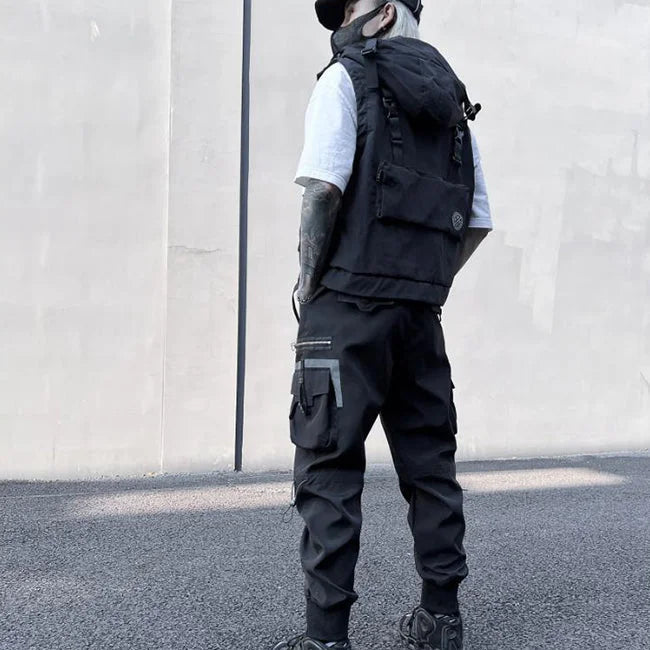 SCHWARZE CARGO HOSE MIT SEITLICHEN REFLEXIONSTASCHEN