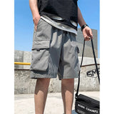 SCHWARZE CARGO SHORTS MIT DETAILS