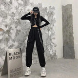 SCHWARZE HIGH WAIST CARGO HOSE MIT KETTE